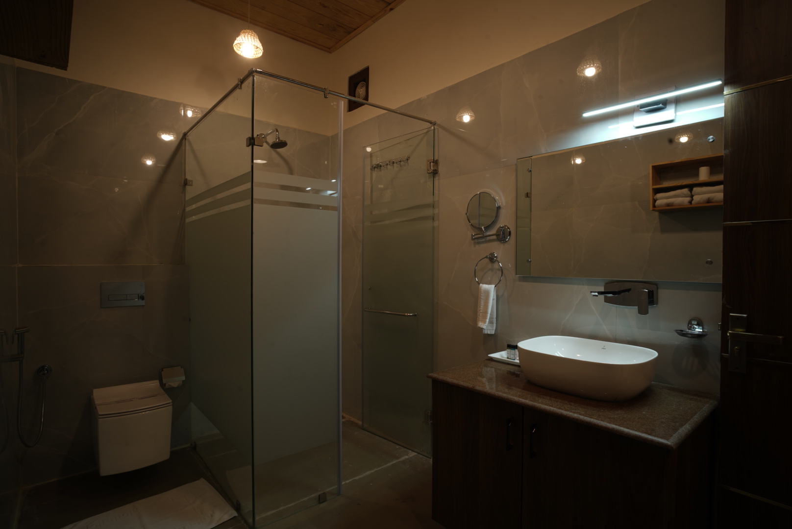Banyan Suite modern bathroom with rain shower at The Banyan Retreat, Jim Corbett
