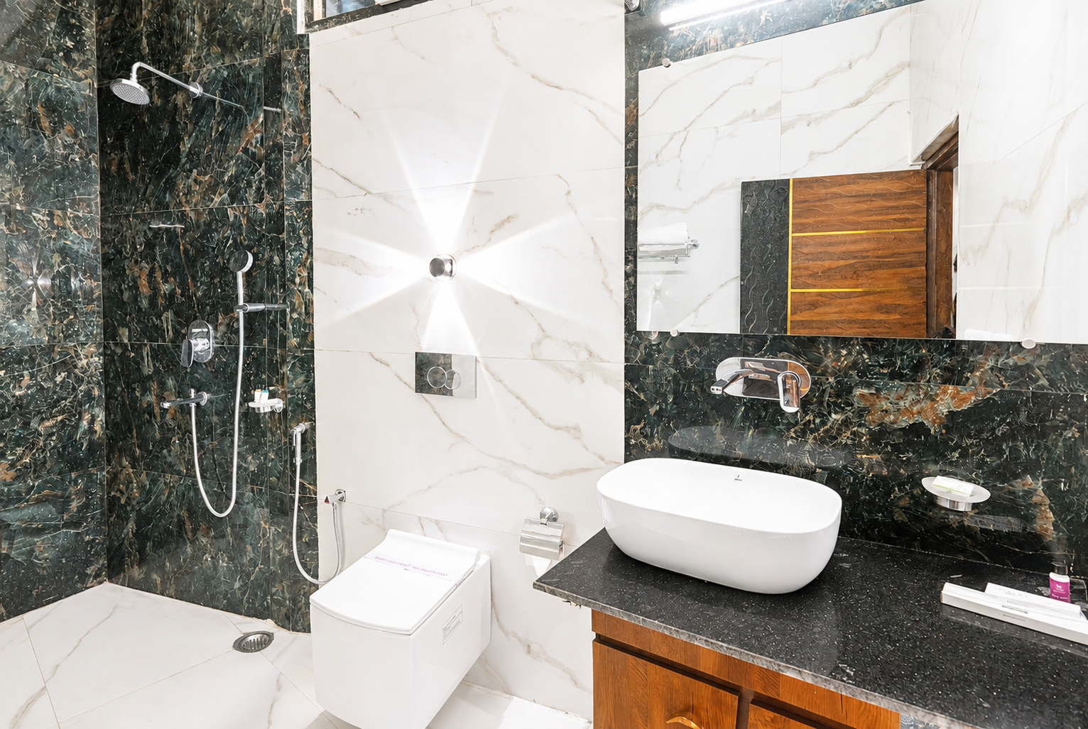 Marble bathroom with walk-in shower and vessel basin in the Elephant Park Premium room