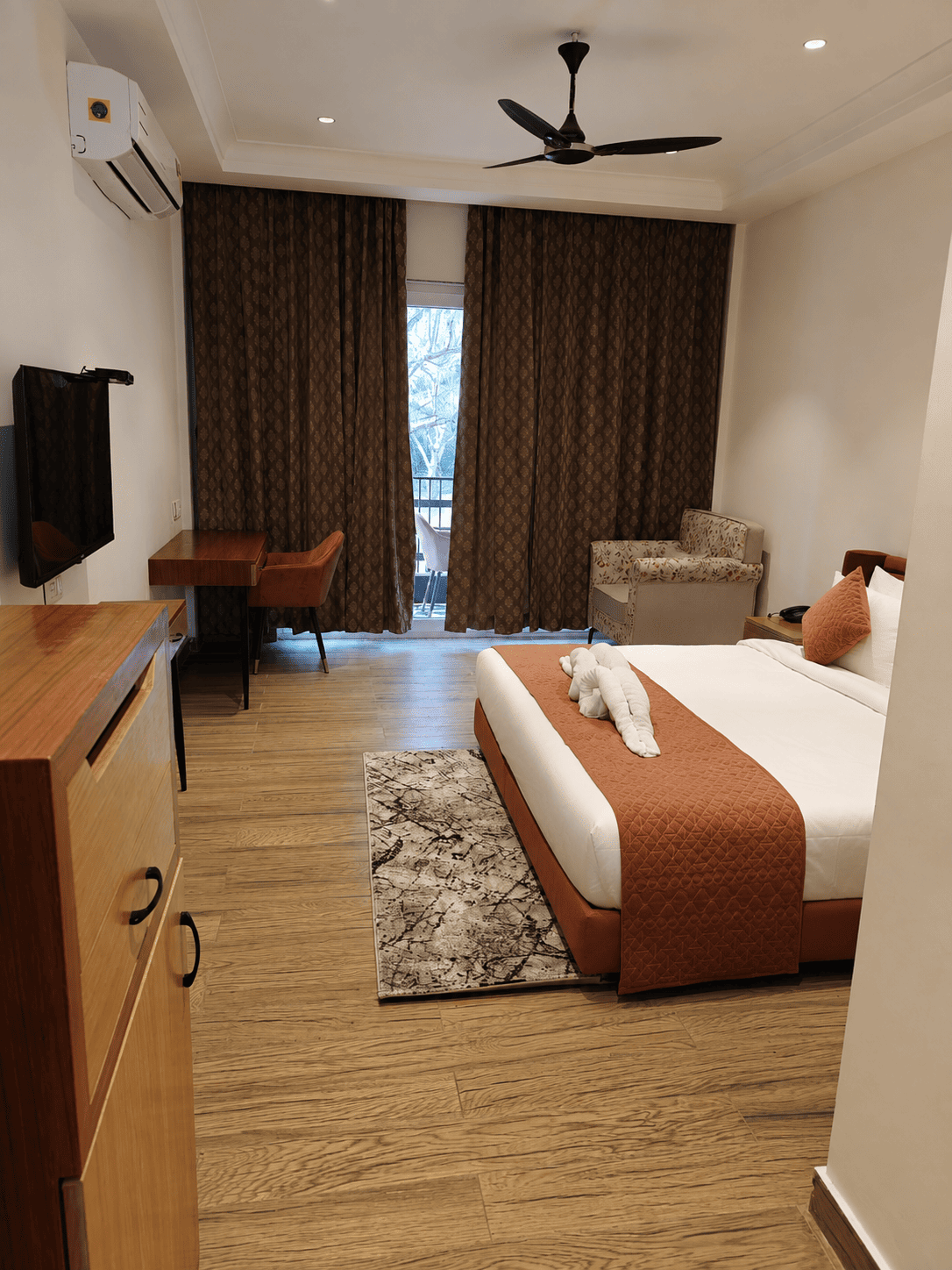 Guest room at Excel Hotels & Resorts, Corbett available for corporate group stays