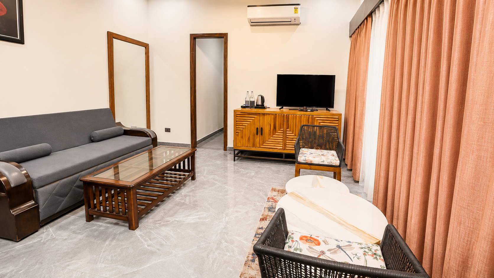 Living area of the Jungle Suite at La Perle River Resort, Jim Corbett