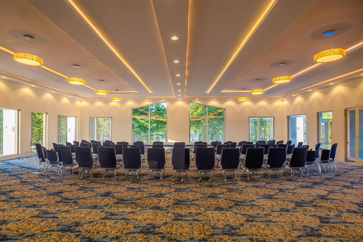 Banquet hall in theatre seating at La Perle River Resort, Jim Corbett