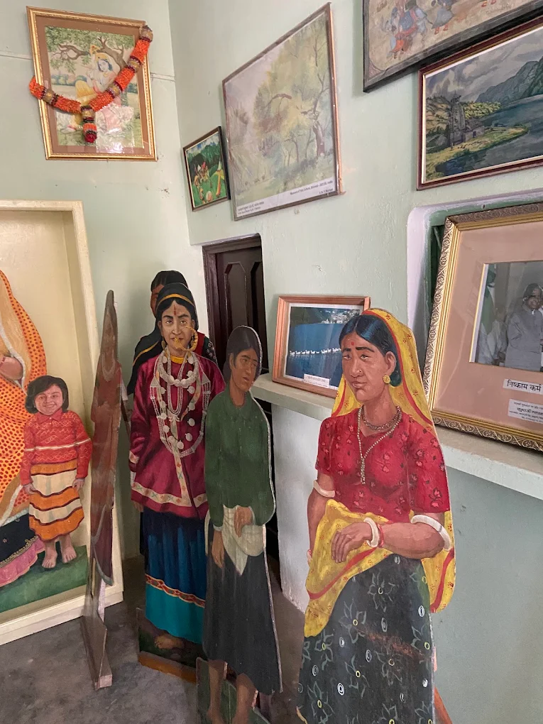Traditional Kumaoni mannequins dressed in regional attire inside the Cultural Museum, Bhimtal