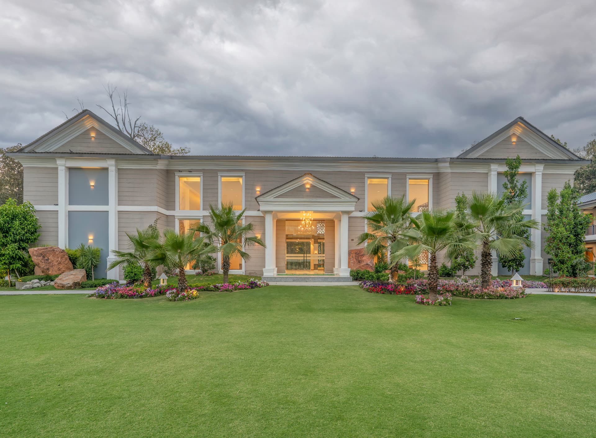 Resort facade and manicured lawns at Excel Hotels & Resorts, Kotabagh