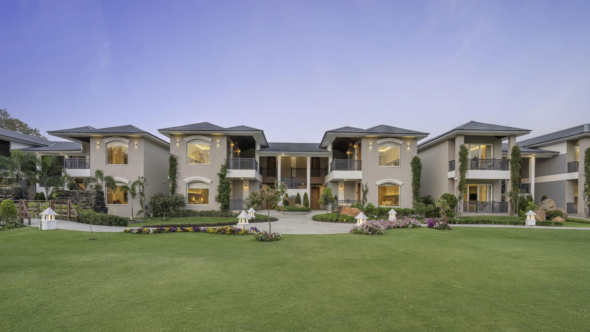 Garden-facing villa blocks with balconies at Excel Hotels & Resorts, Kotabagh