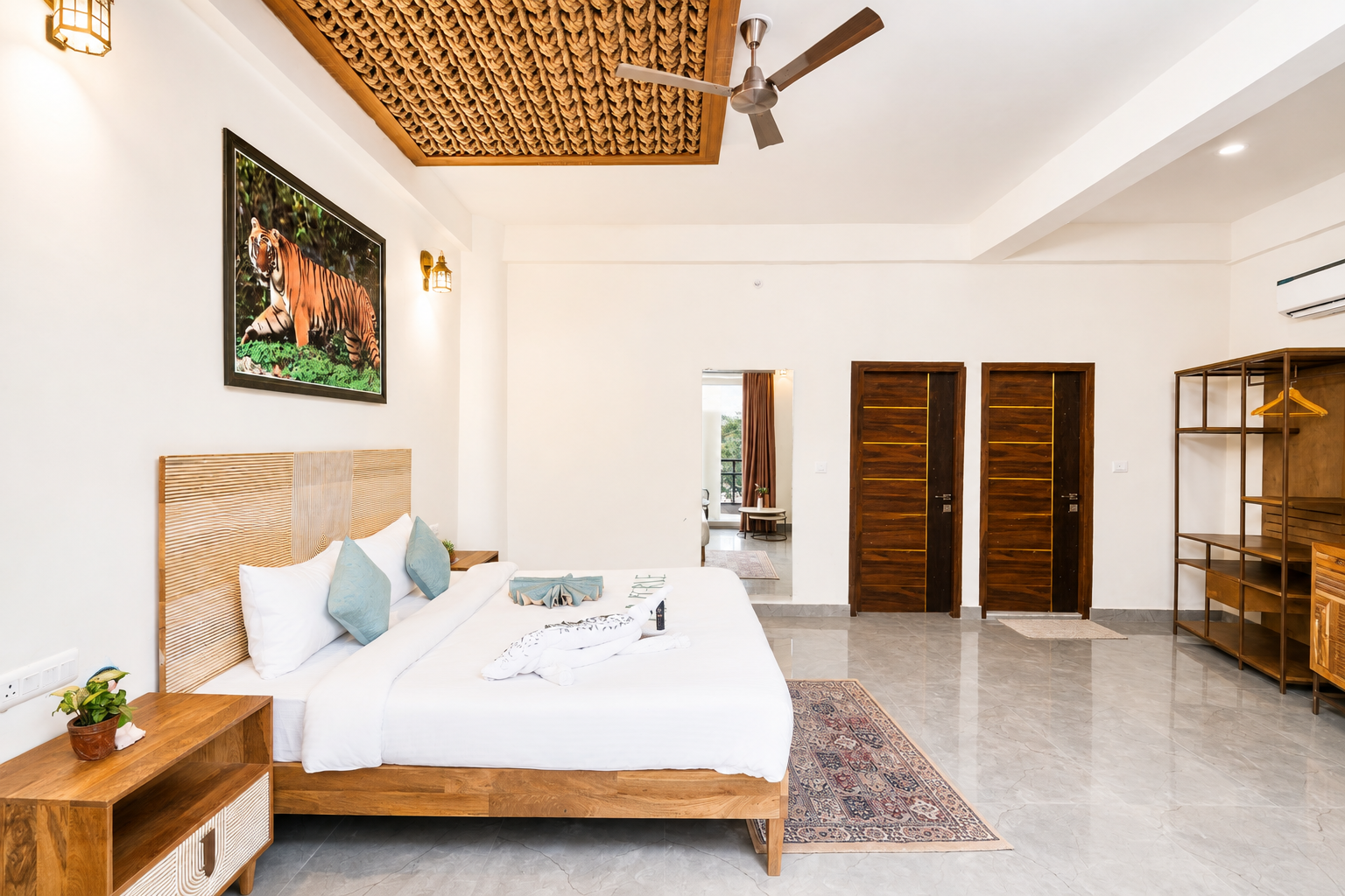 Double bed inside the Elephant Park Premium room at La Perle River Resort