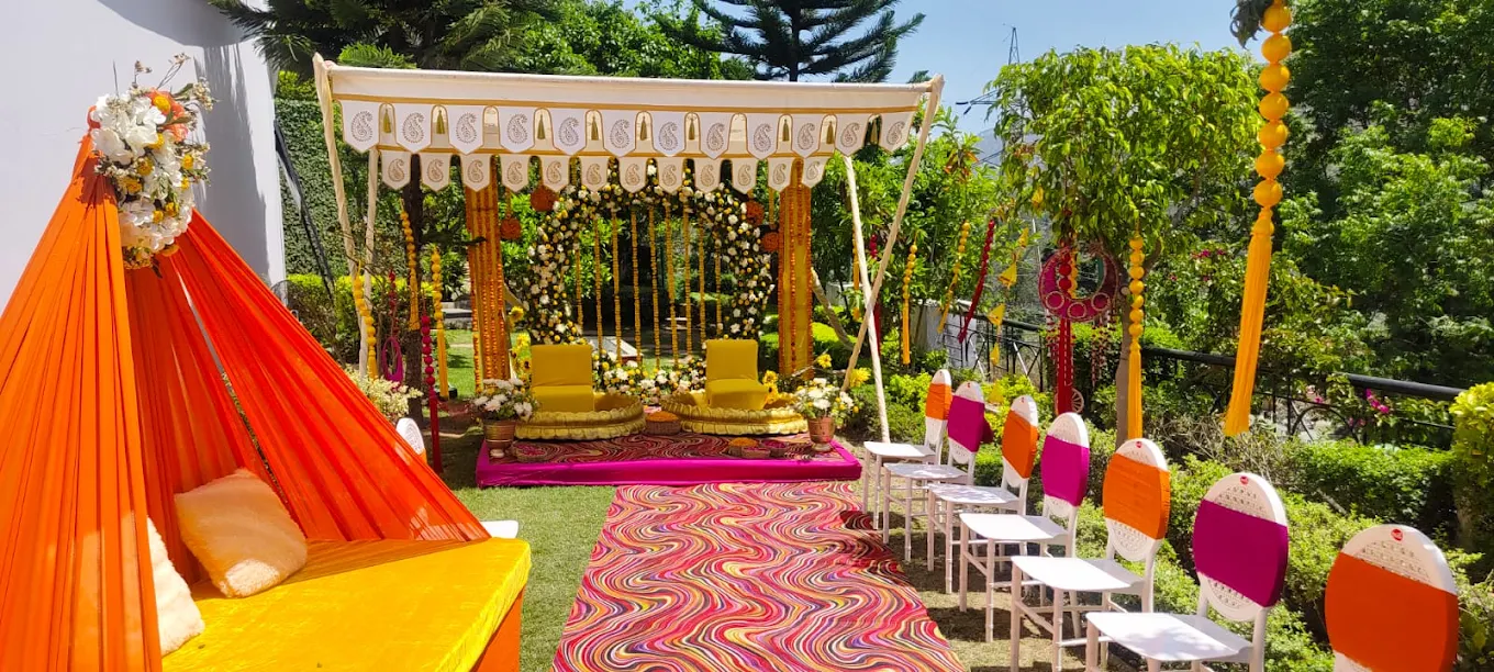 Colourful wedding mandap at Excel Hotels & Resorts, Bhimtal