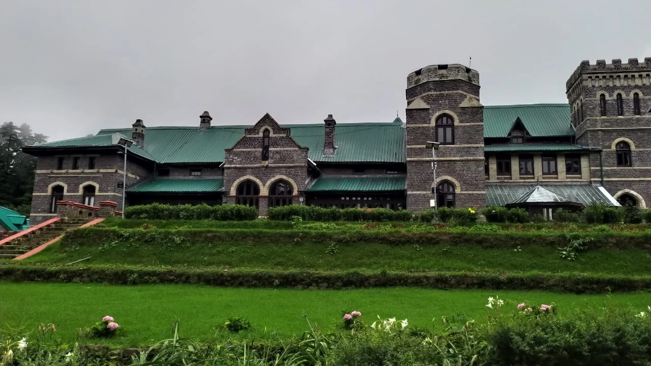Raj Bhawan terraced lawns and heritage stone building with green roof