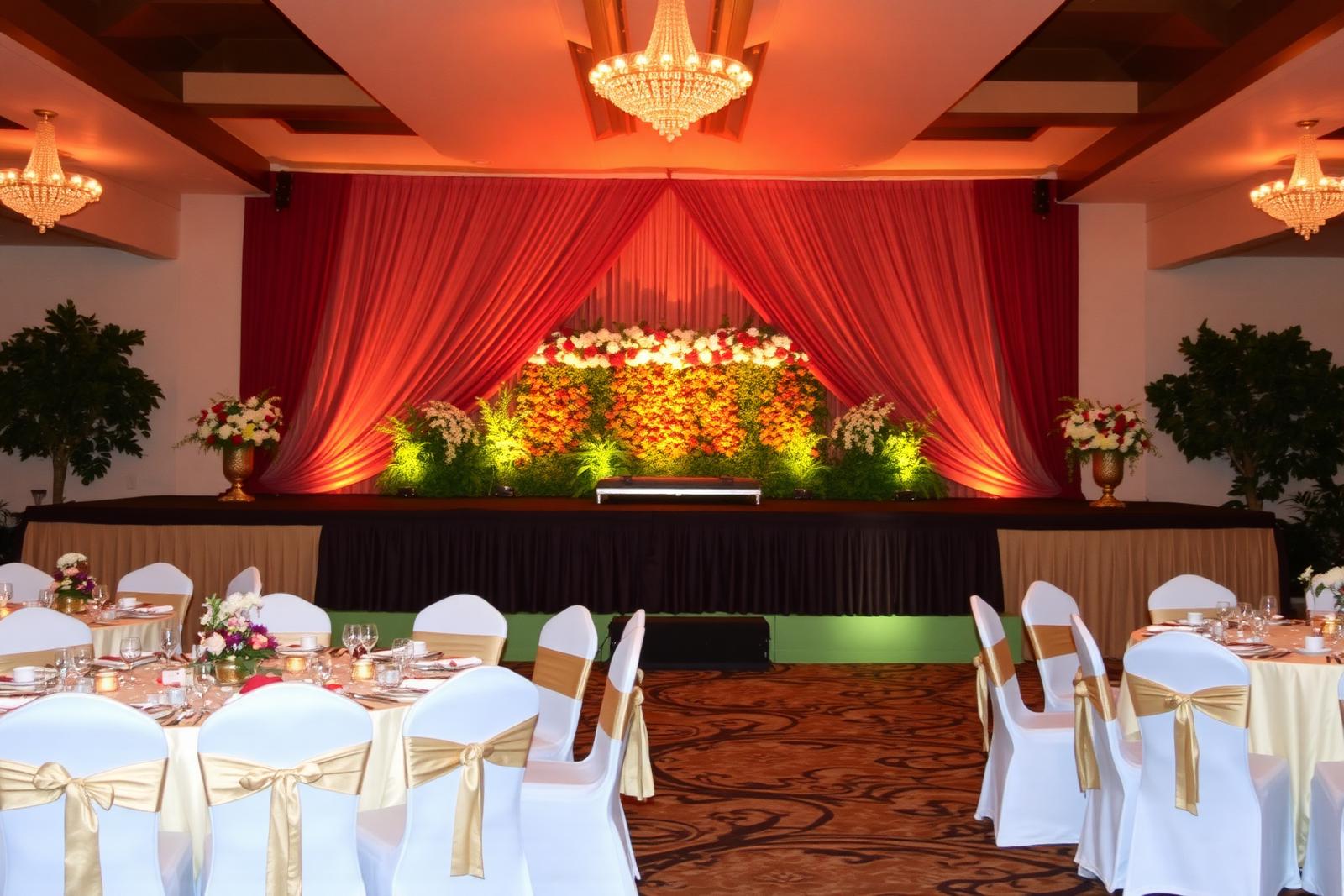 Evening reception stage and banquet seating at Excel Hotels & Resorts, Corbett